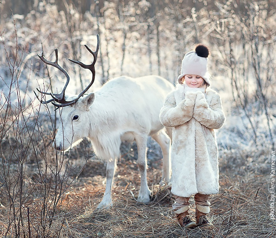 Adorable Photos Of Animals And Kids Playing In Snow  (12)