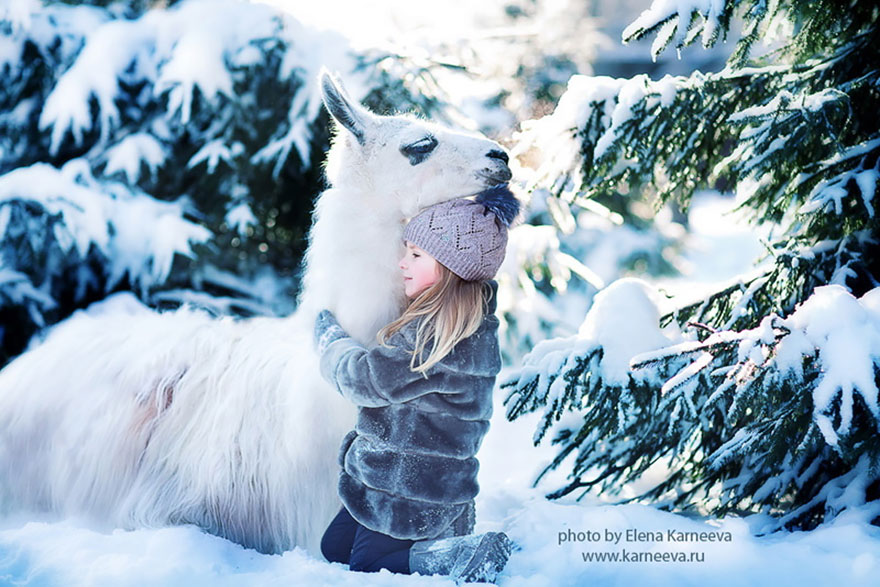 Adorable Photos Of Animals And Kids Playing In Snow  (9)